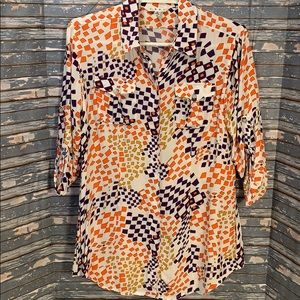 CAbi 3/4 sleeve blouse with hidden buttons.